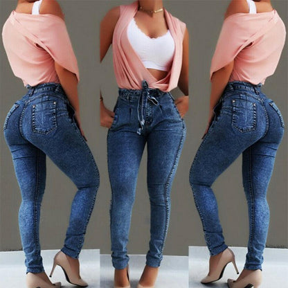High waisted jeans with tassel belt